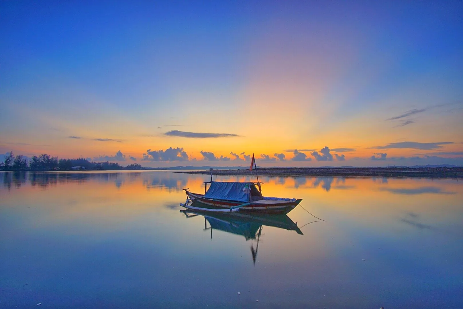 Lonely Boat with Amazing sunrise