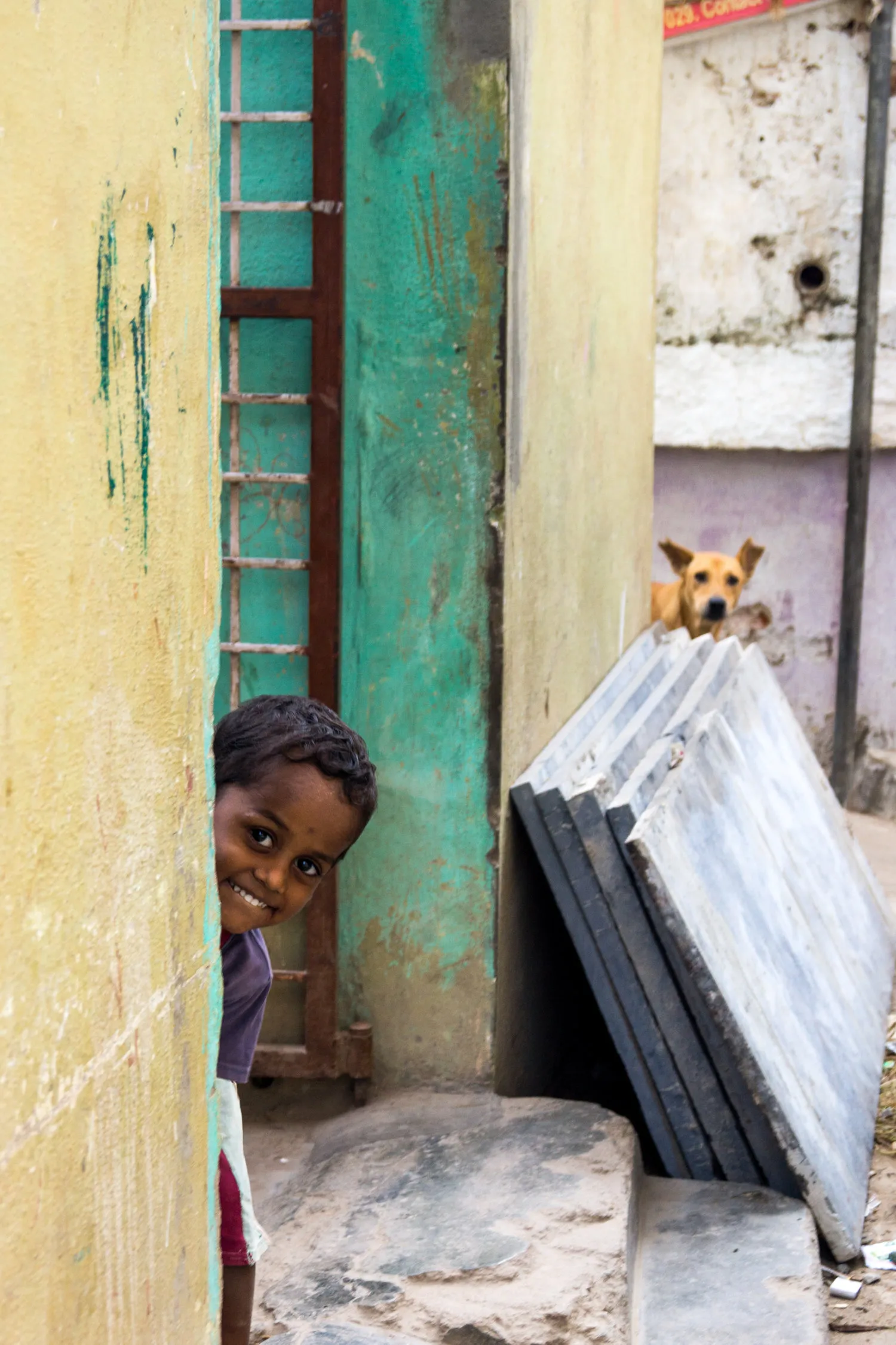 Boy and stray dog in Bangalore