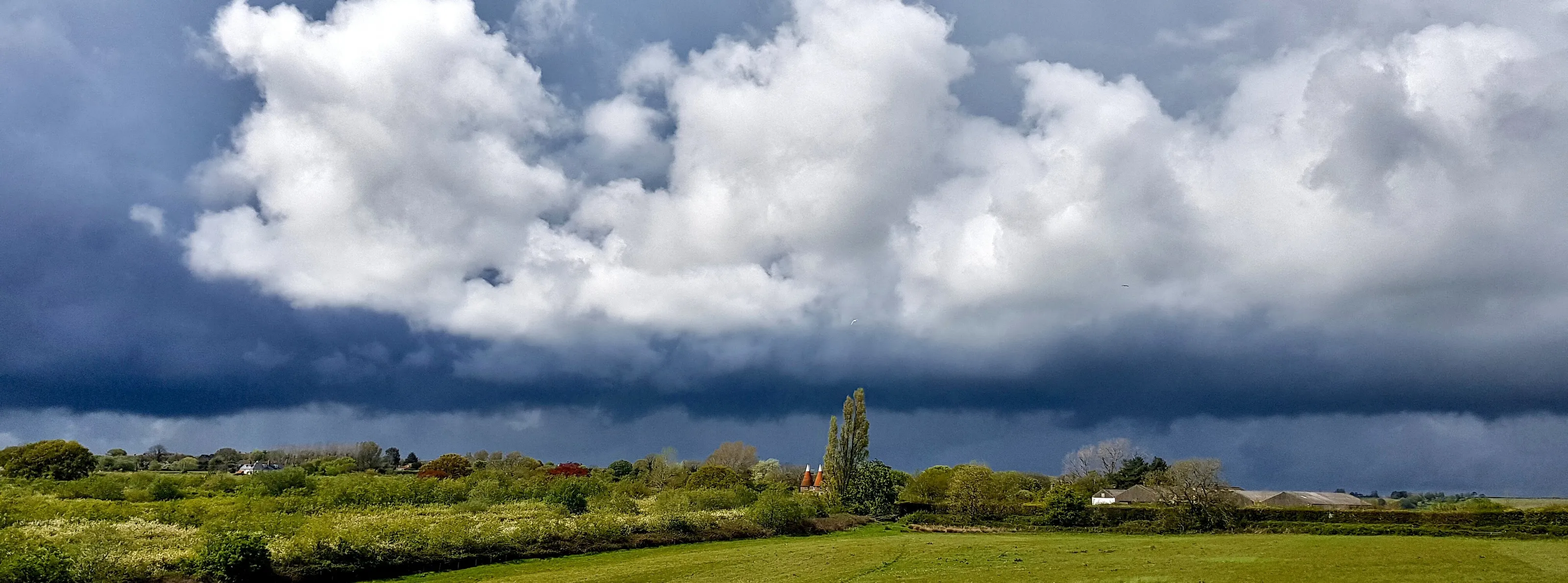 Manor Farm Oast under Storm Clouds