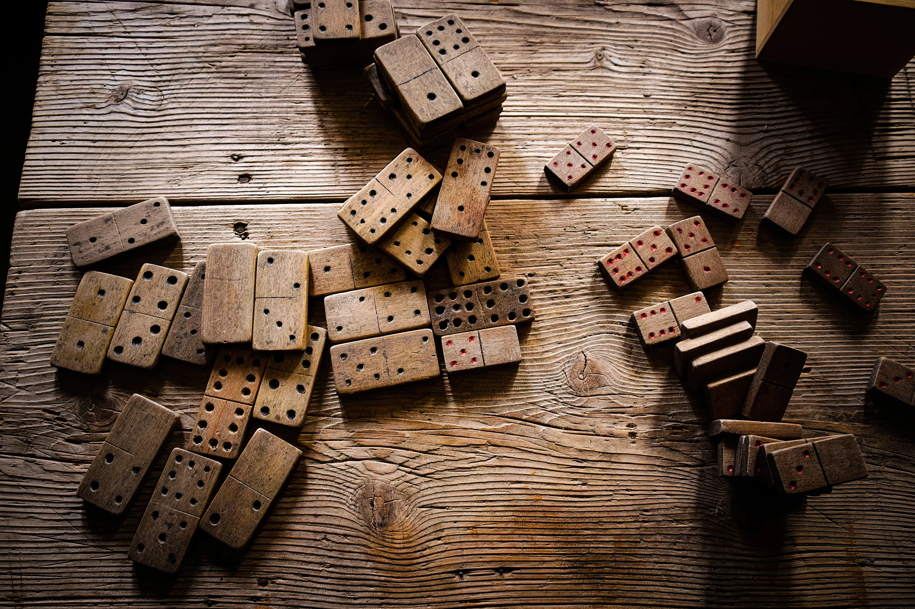 Old wooden domino game on wooden table