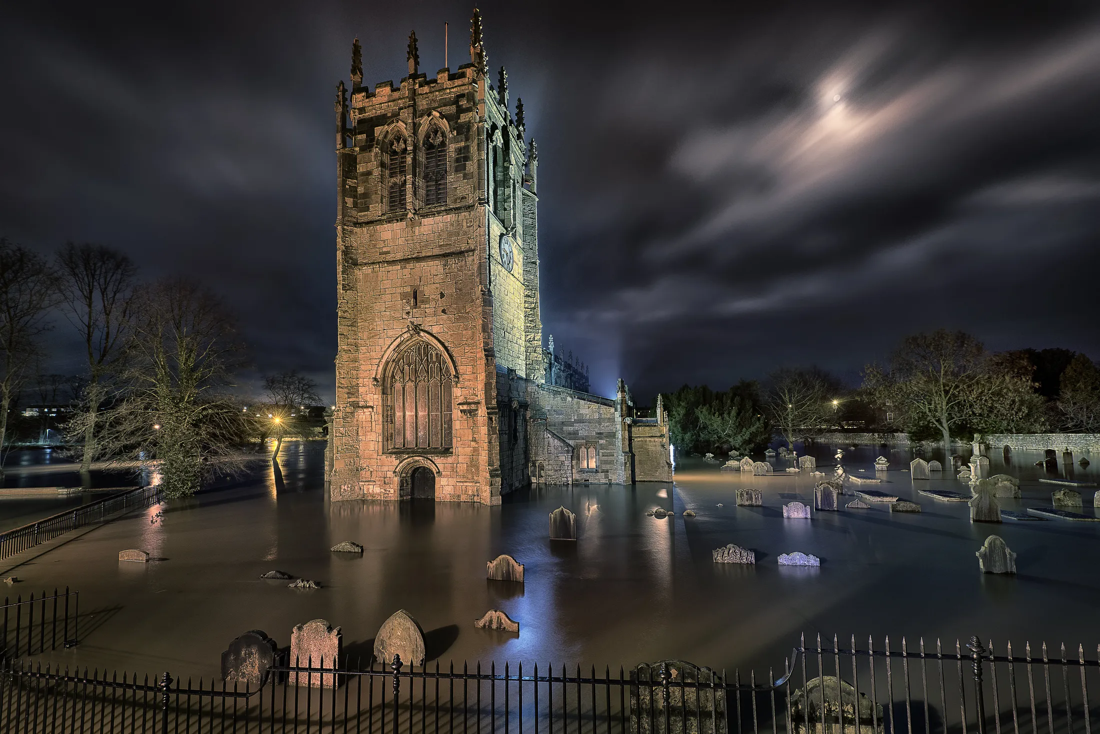 Flooded grave yard, St Mary's Tadcaster, North Yorkshire