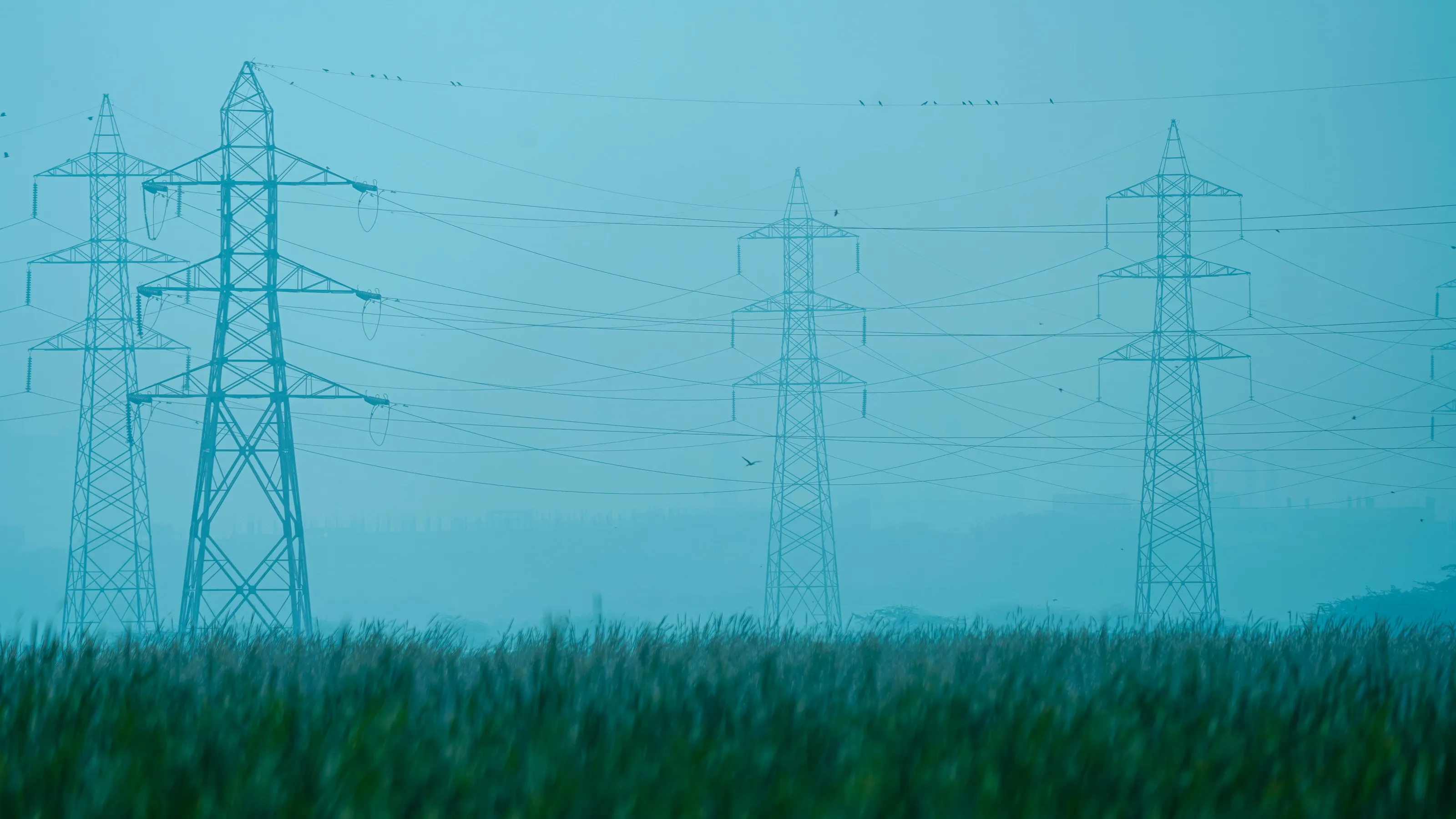 Transmission Tower on Foggy Morning