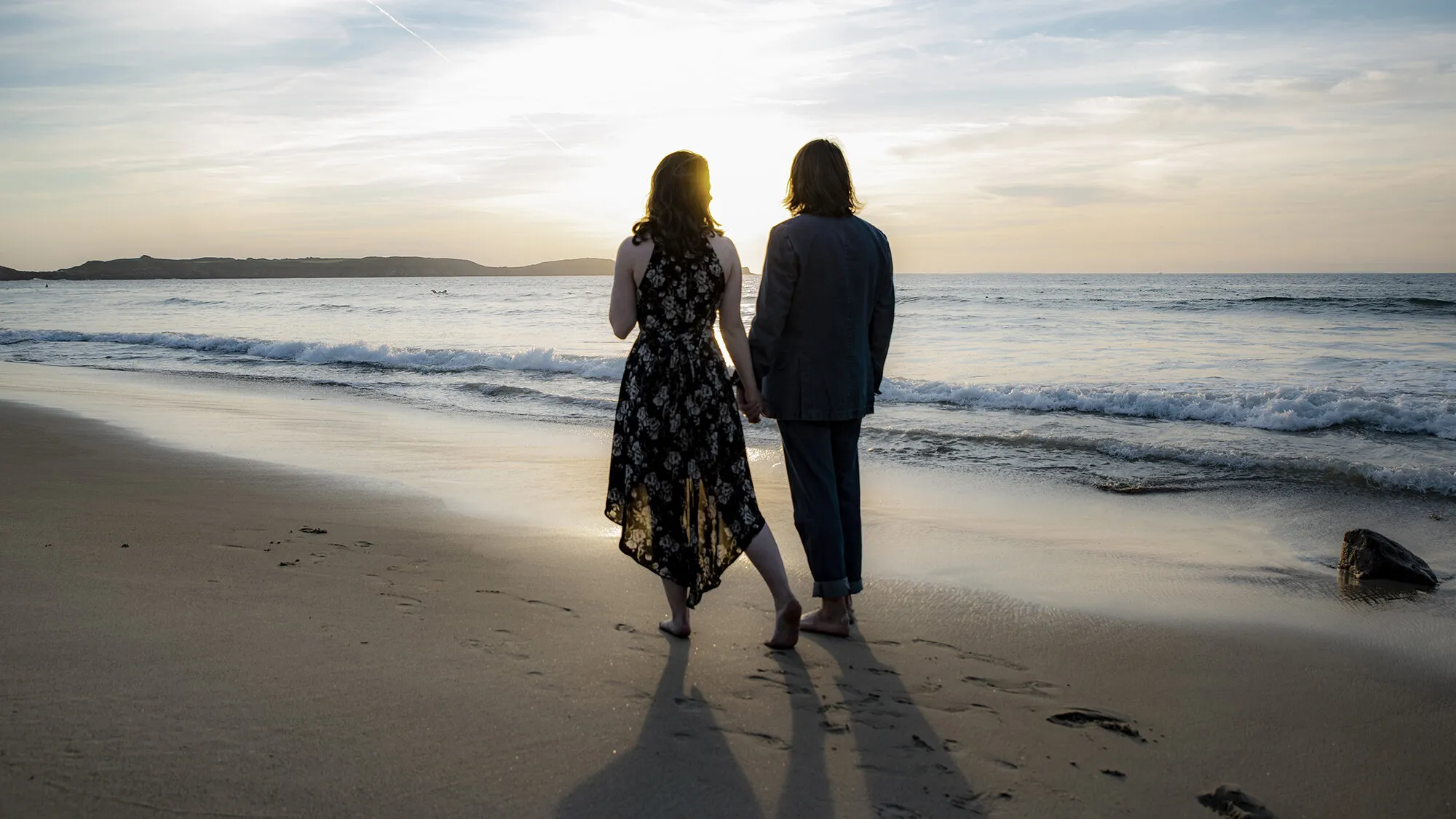 lover walking at the beach