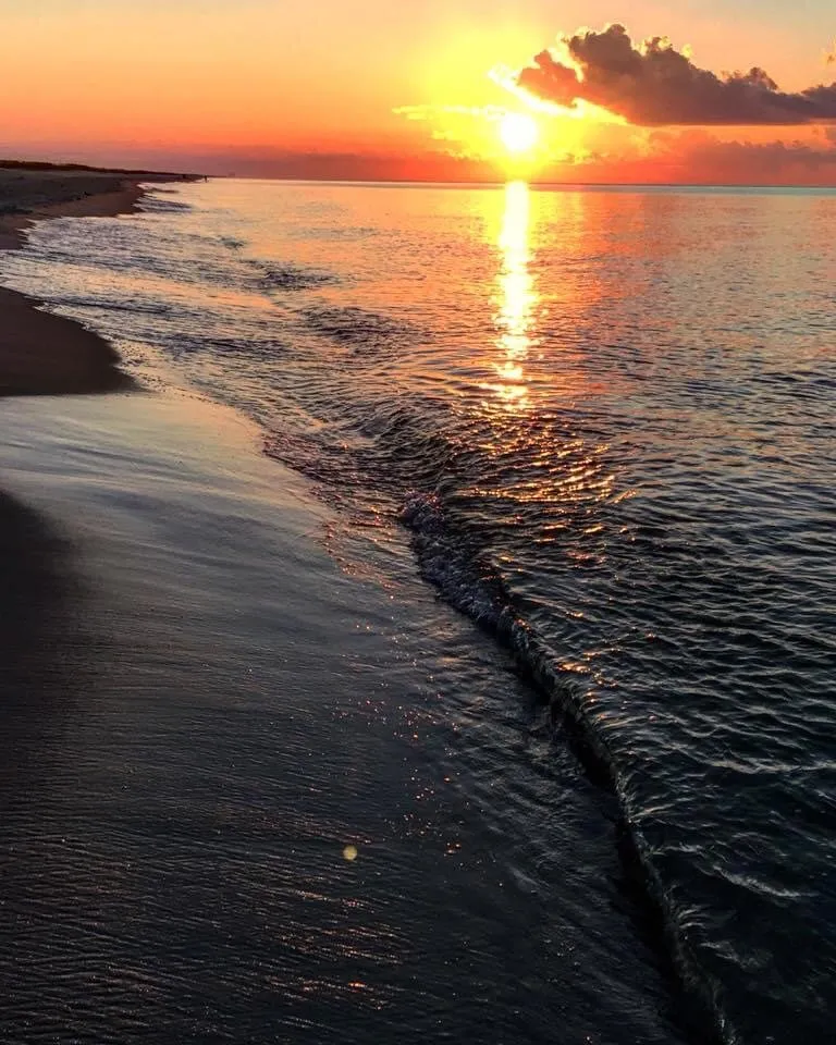 Sunrise on the Rolling Water