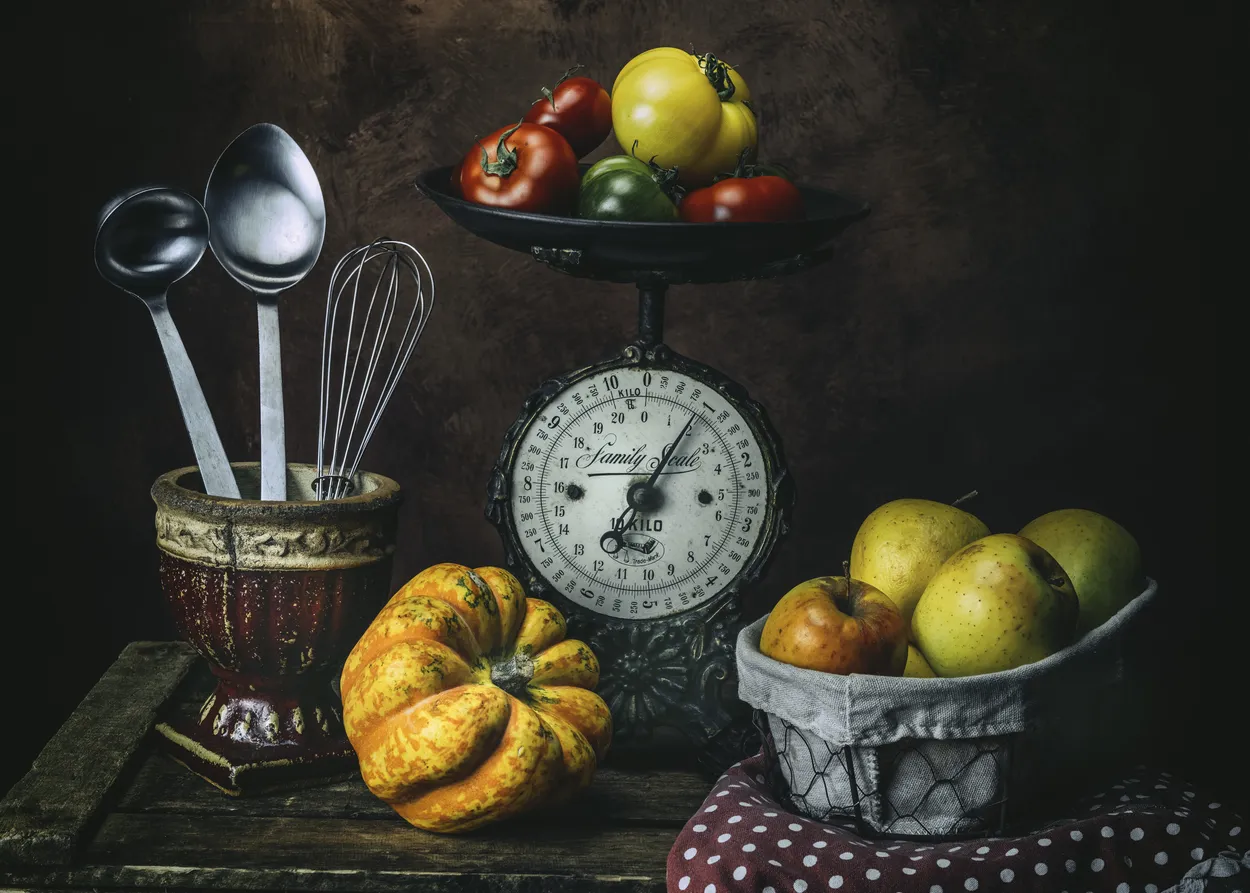 Still life with tomatoes, apples and pumpkin