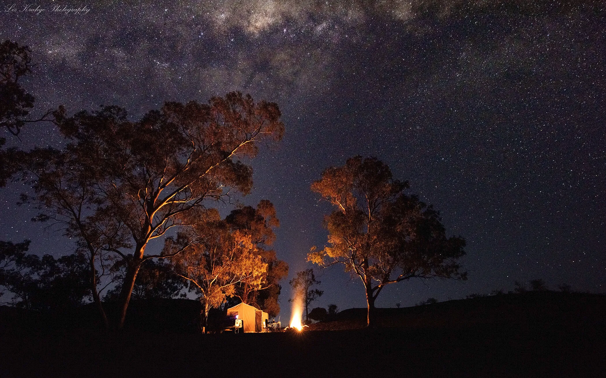 Camp fire by night