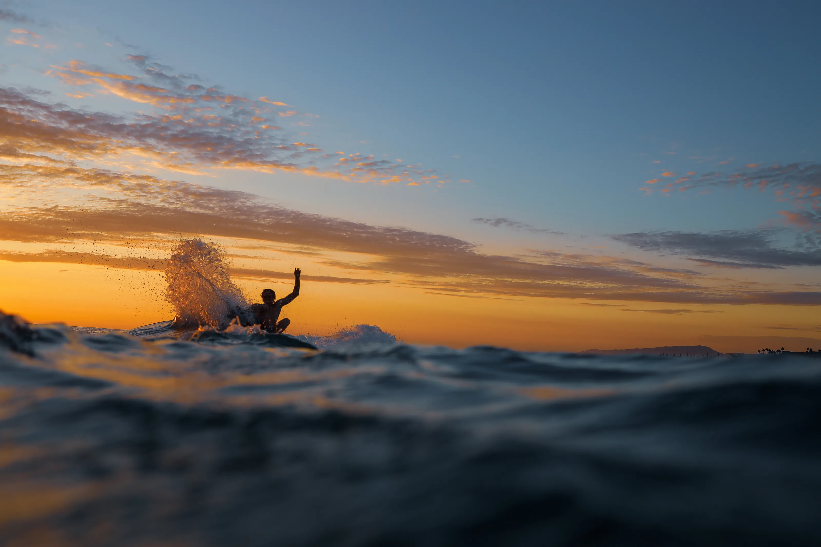 SUNSET SURFER