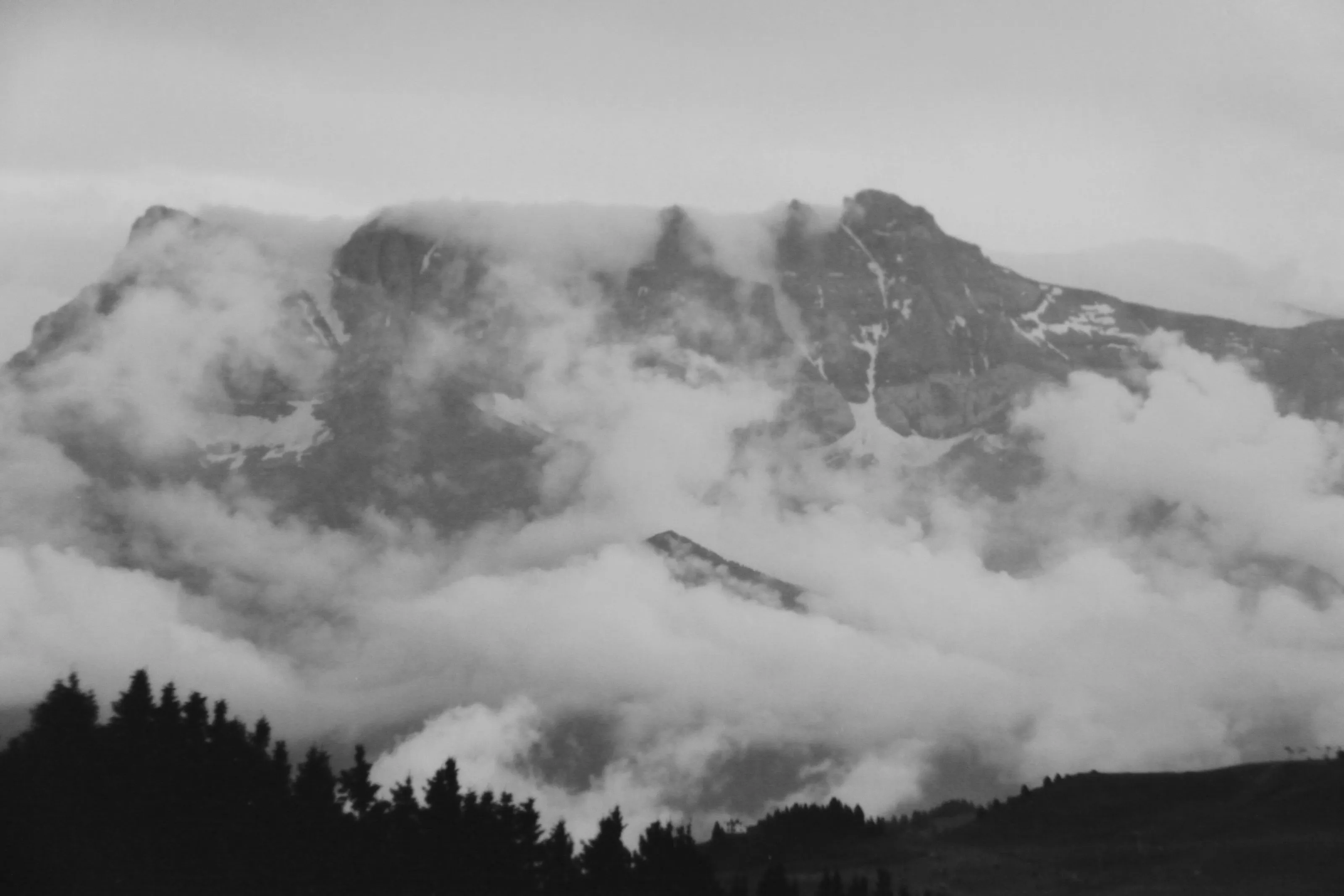 Under the clouds.