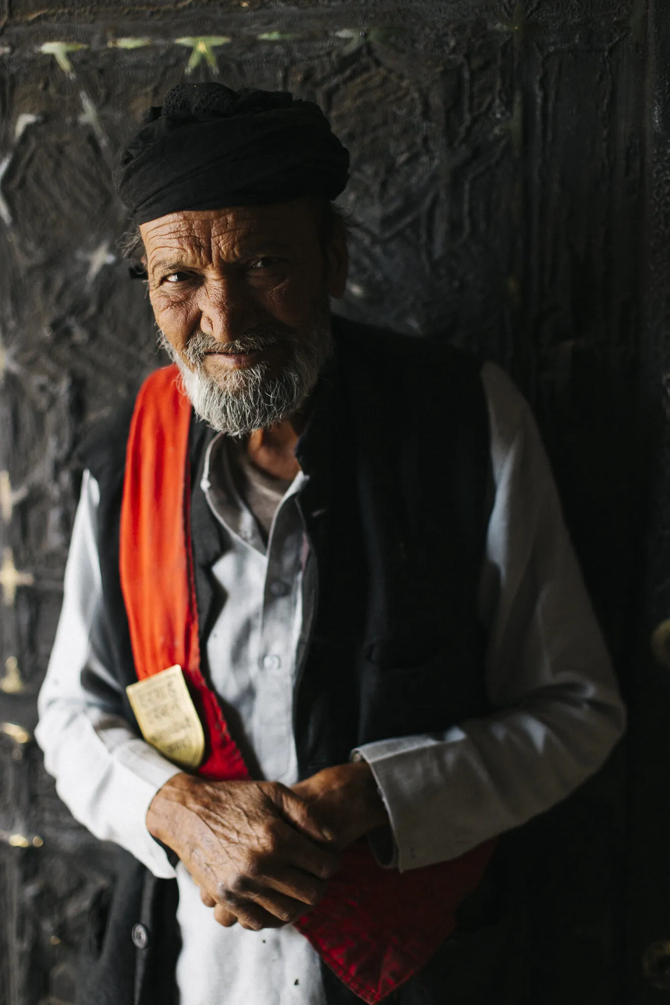 Serenity in Shadows - A Revered Soul - A Low Key Portrait of an Elderly Muslim Devotee
