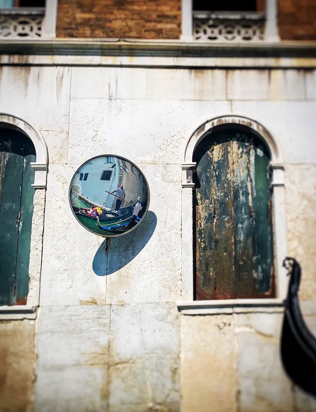 Venice gondolas in the mirror