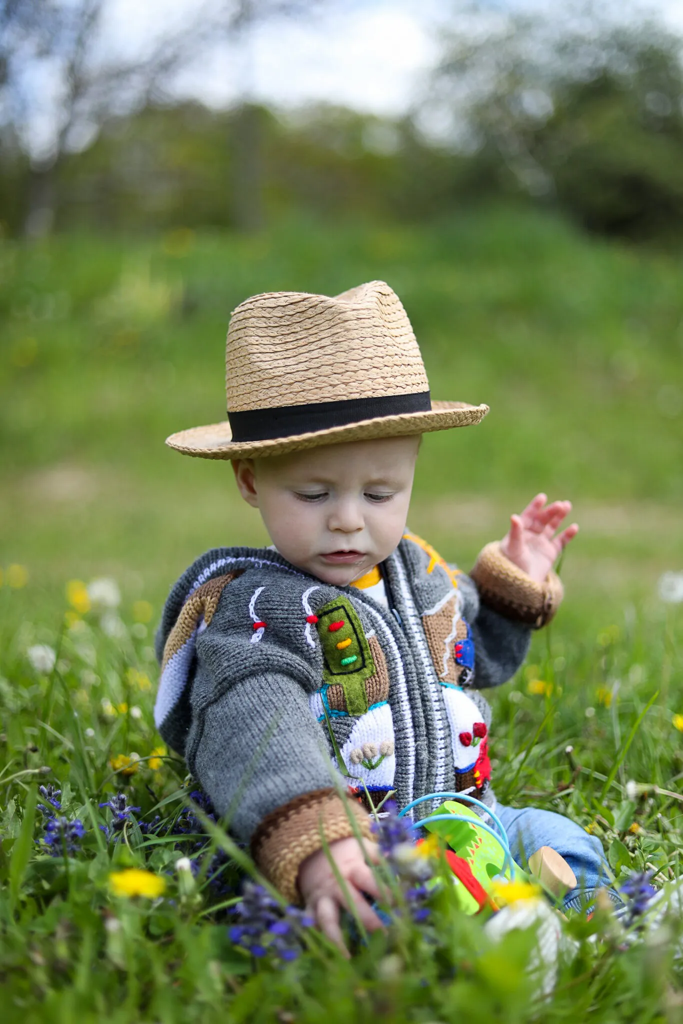 Baby playing in the grass
