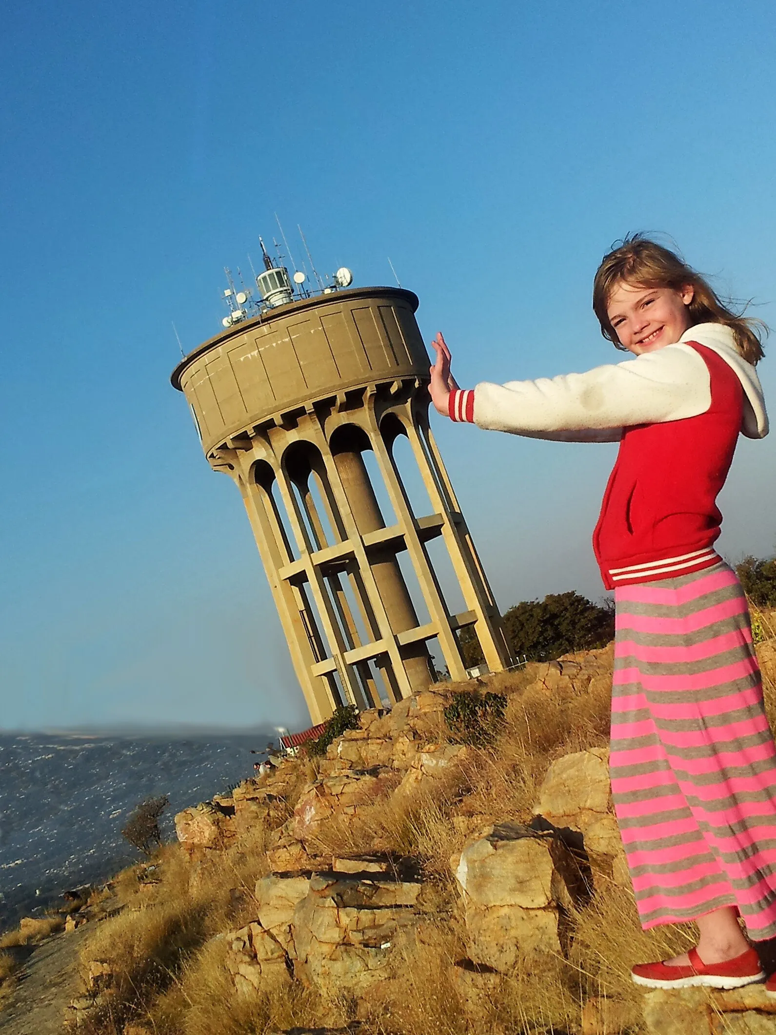 Giant pushing over water tower!