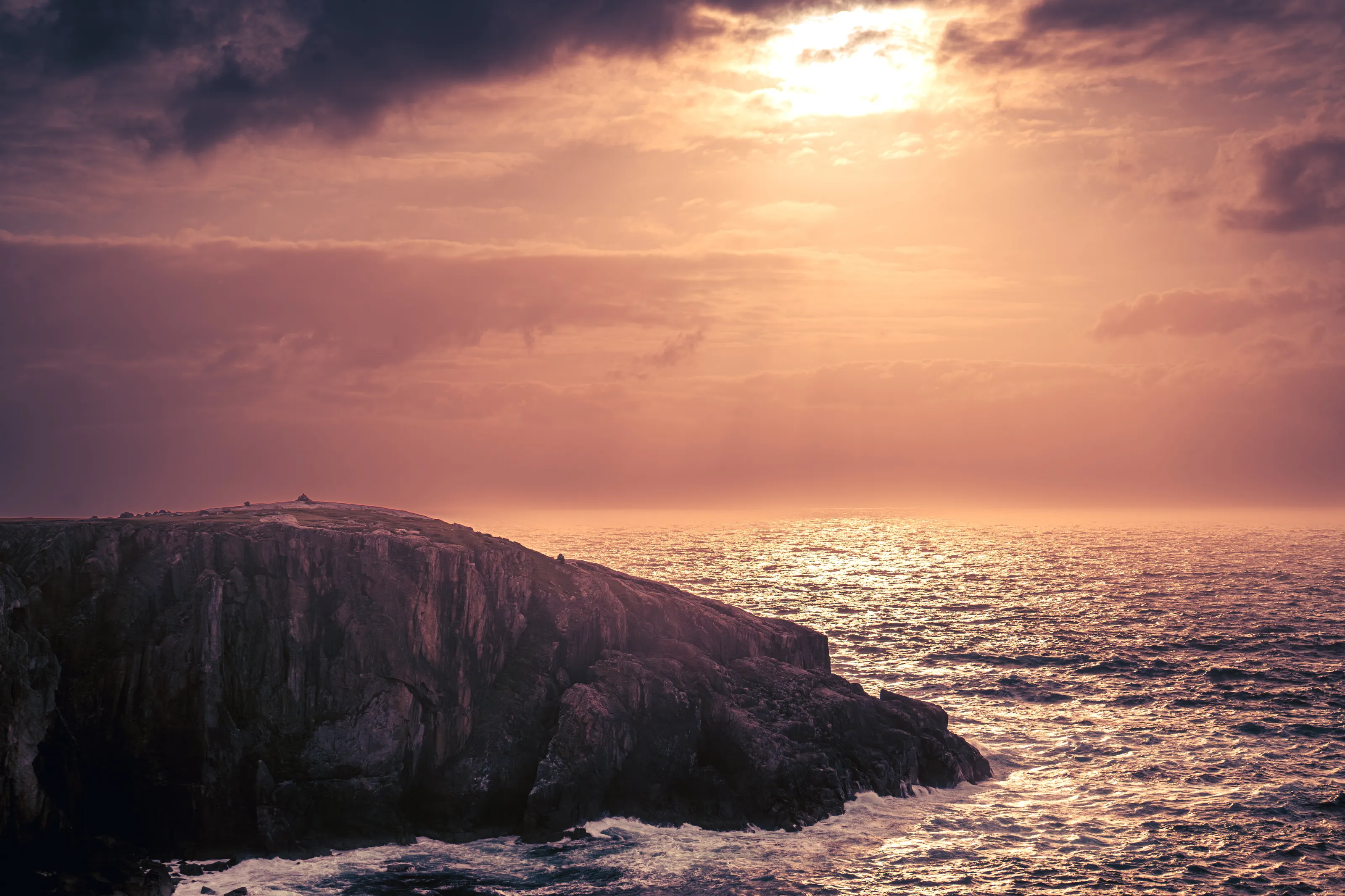 Sunset at one of the sea stacks in Hebrides