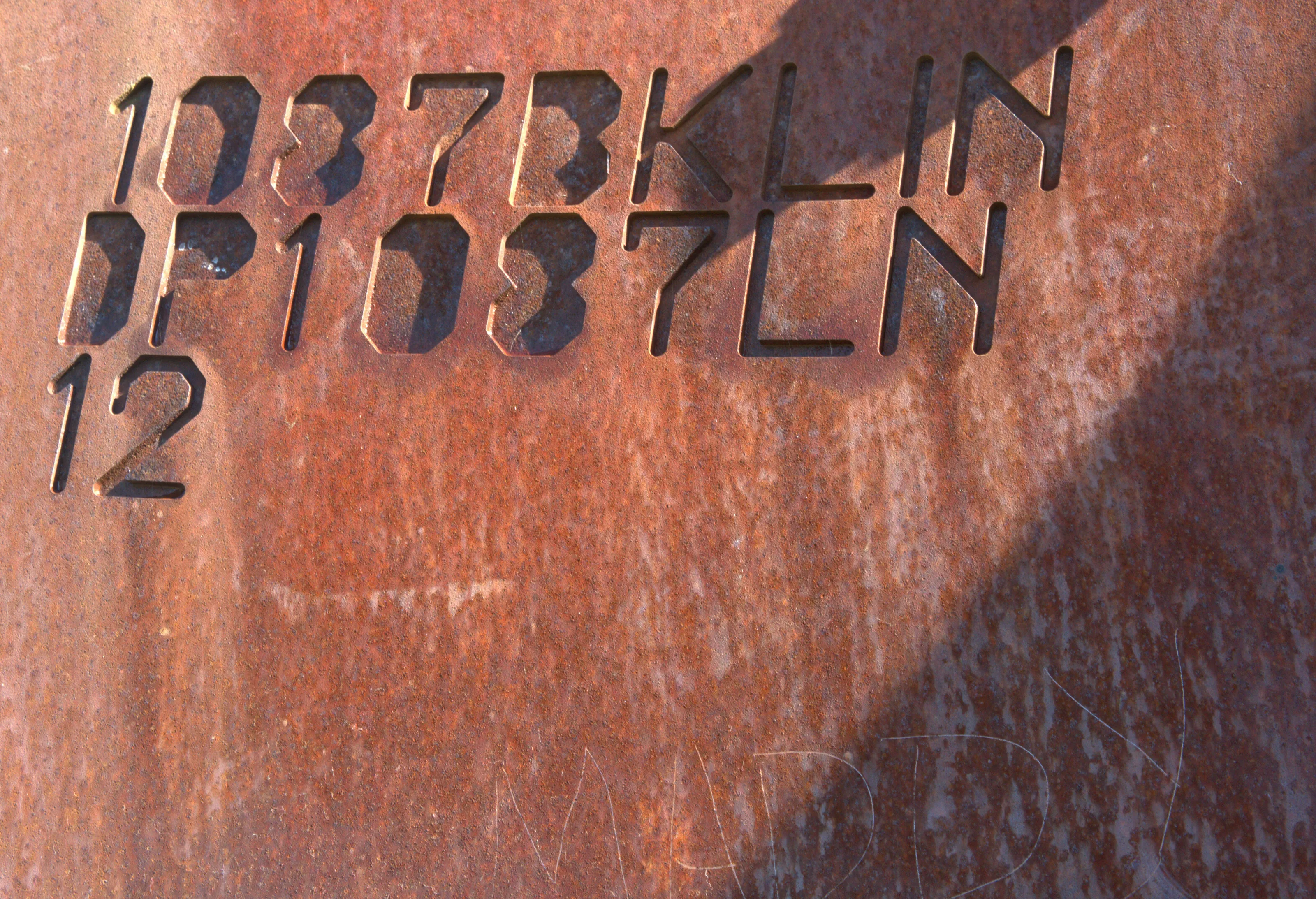 rusty letters and numbers
