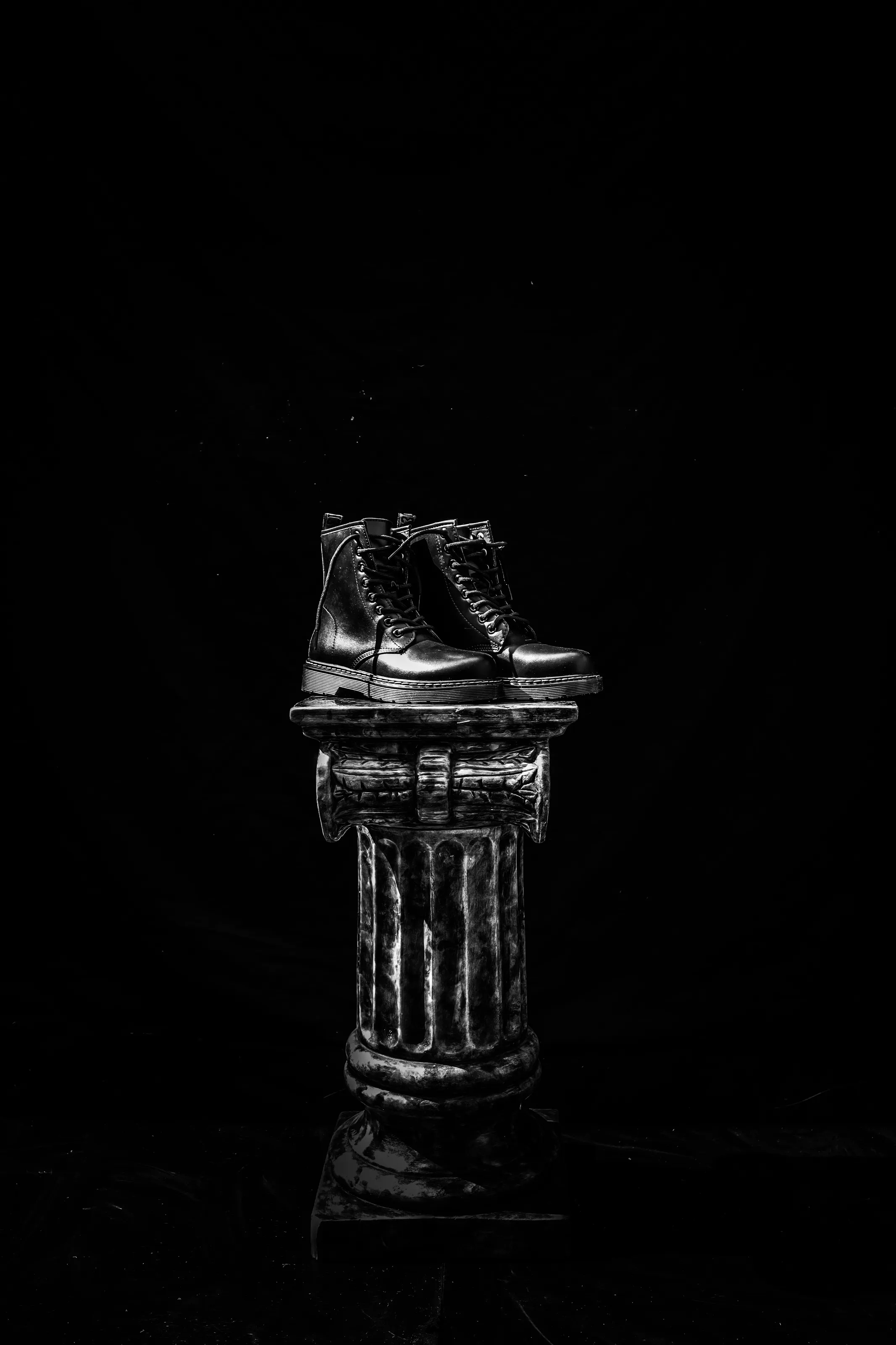 Boots on a pedestal.