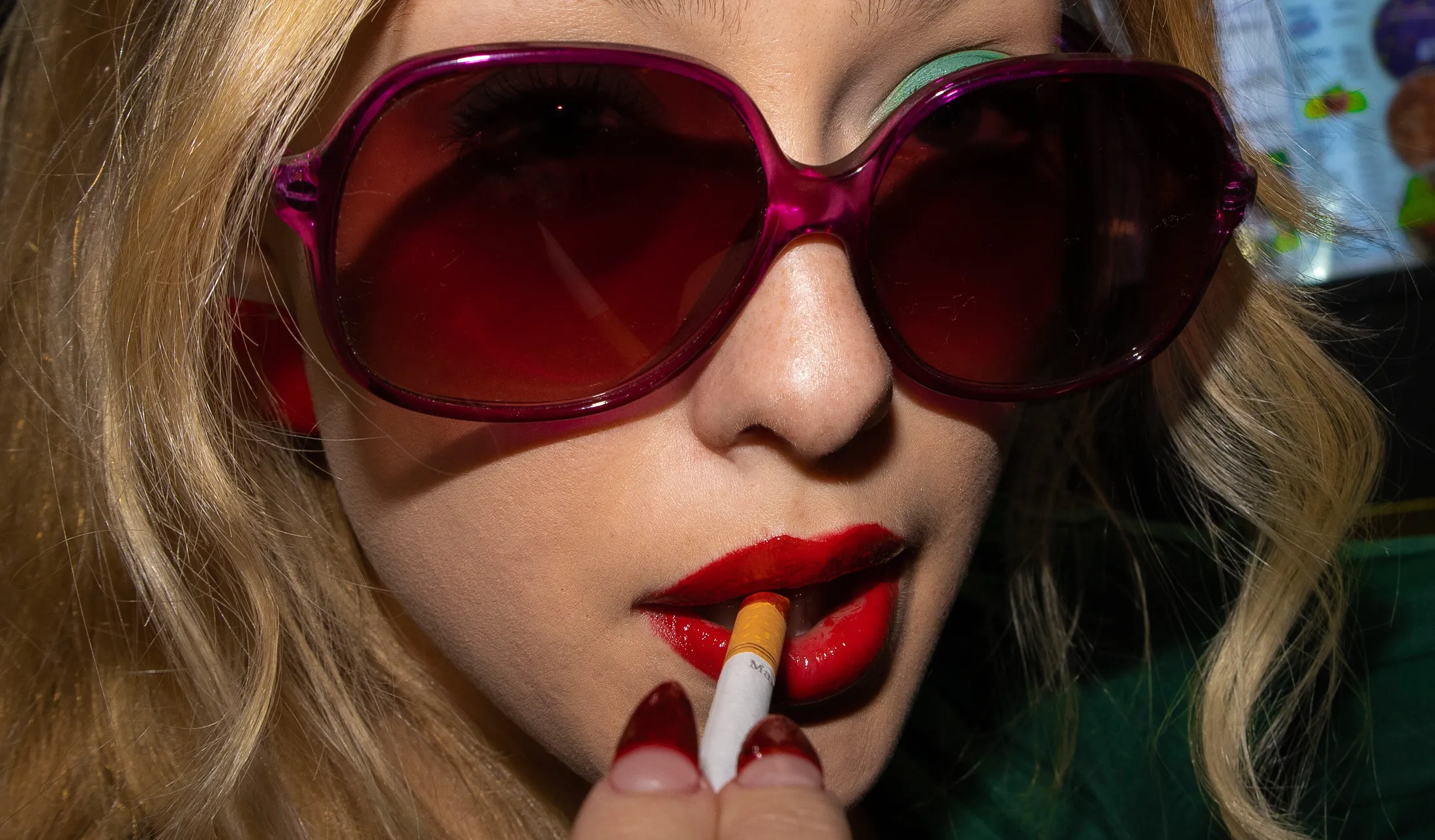 The Woman in Purple Glasses