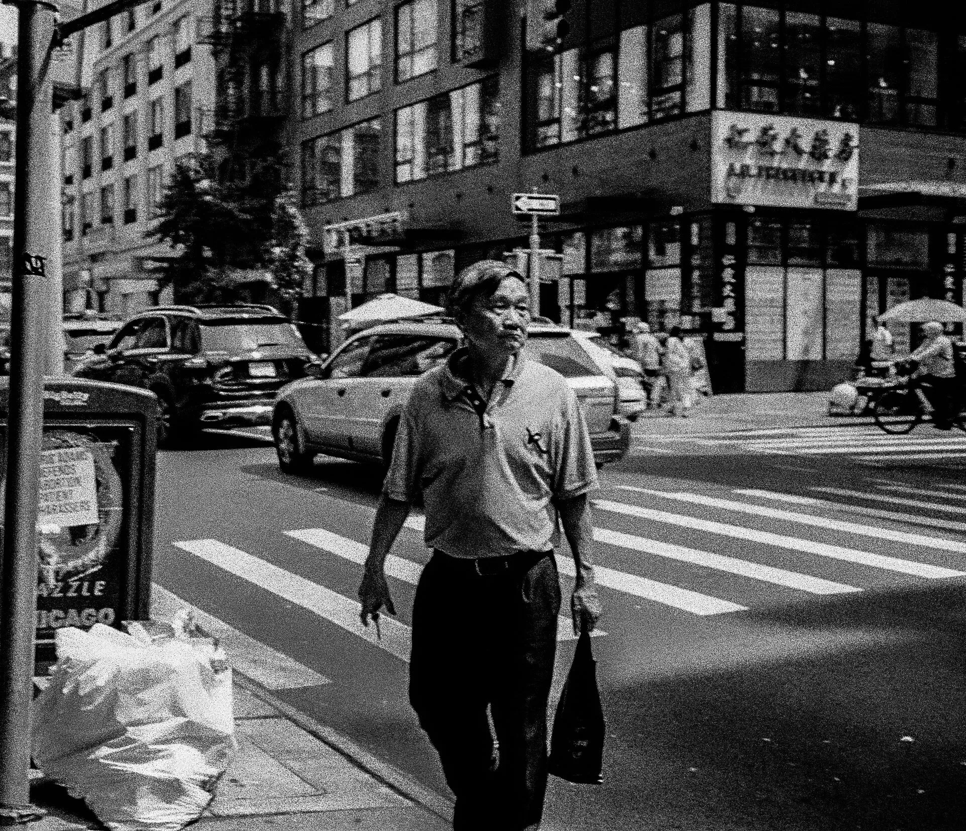 Man Crossing Grand Street