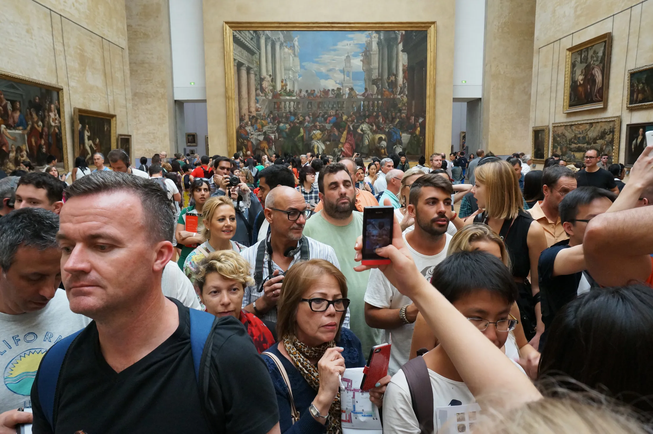 Tourists at the Louvre Museum in Paris