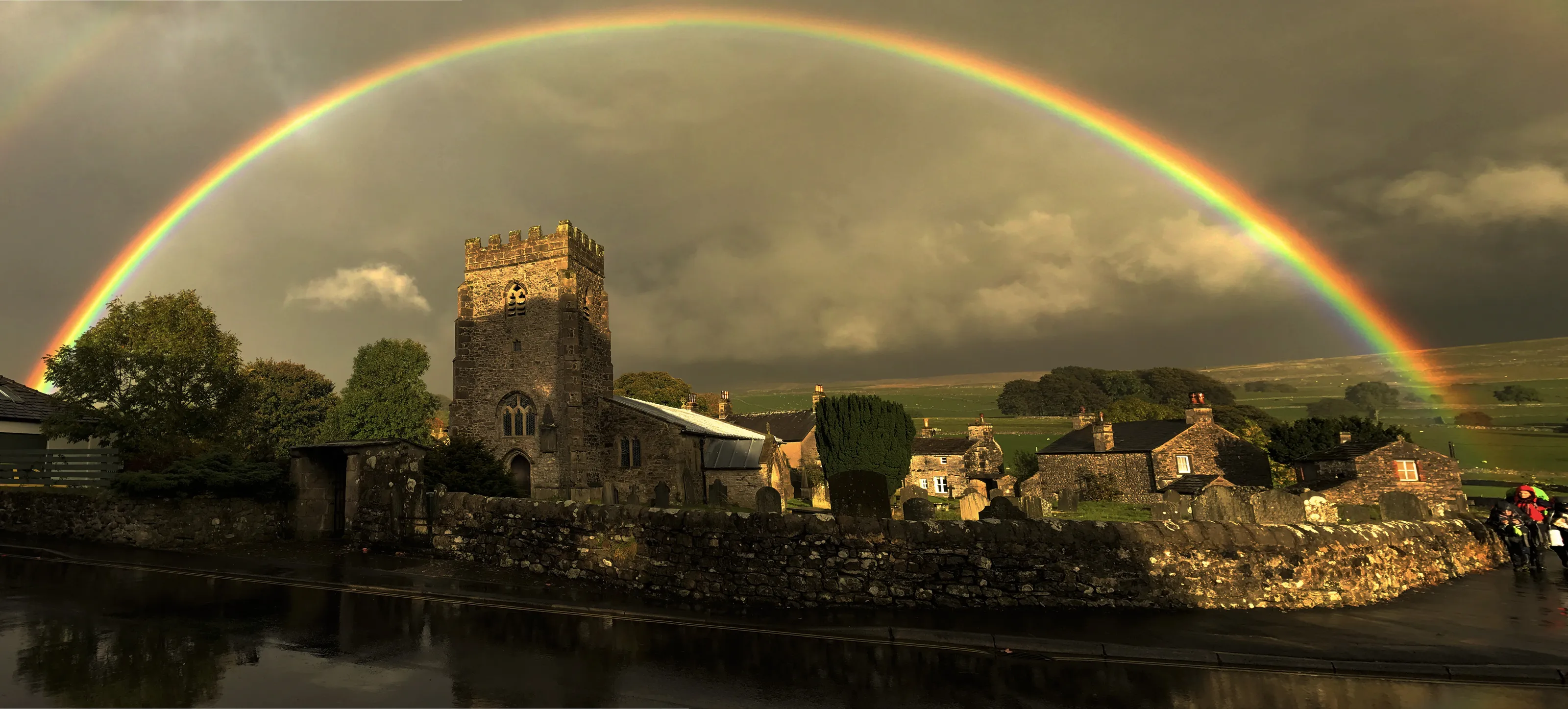 Rainbow over church