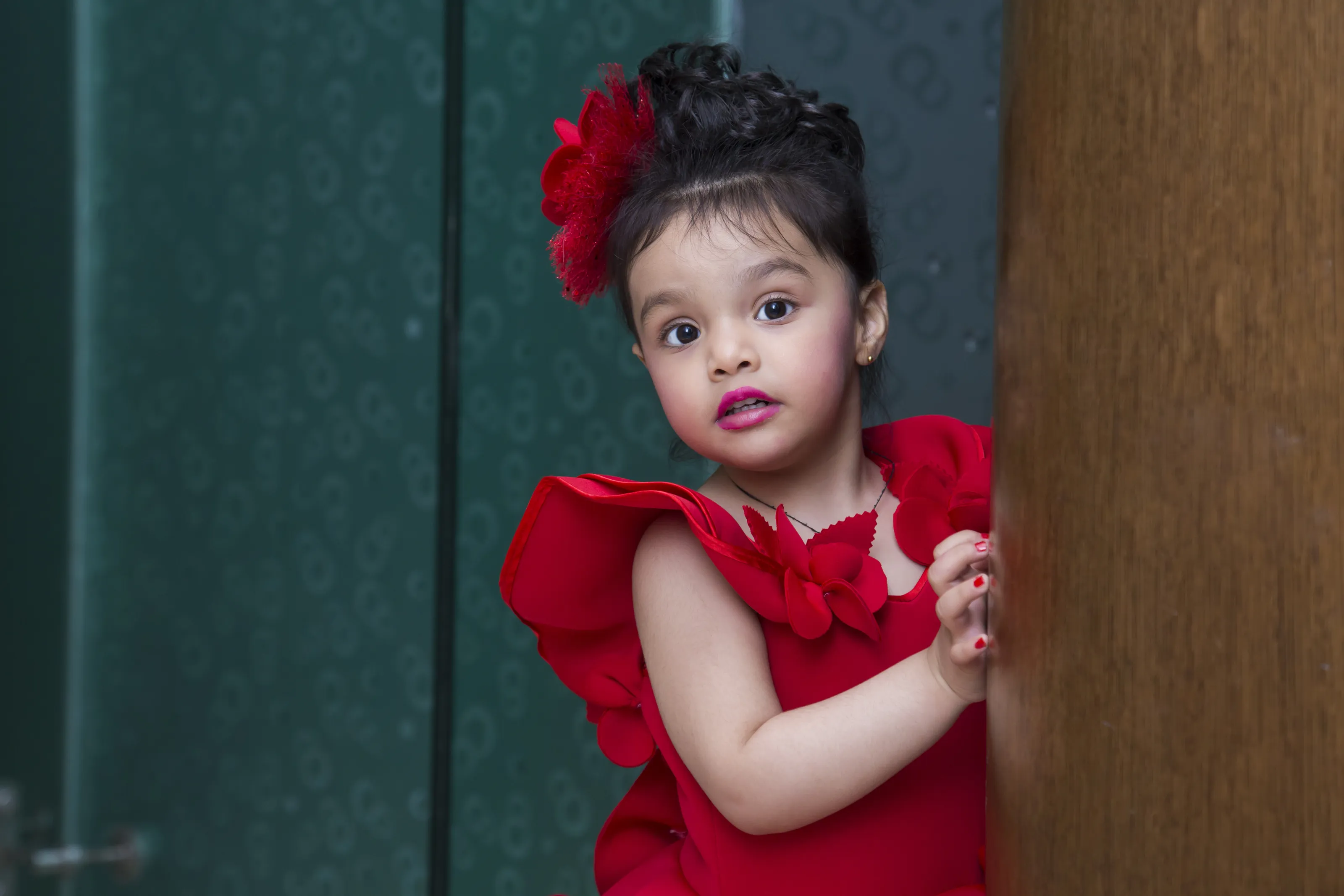 cute little girl in beautiful red dress