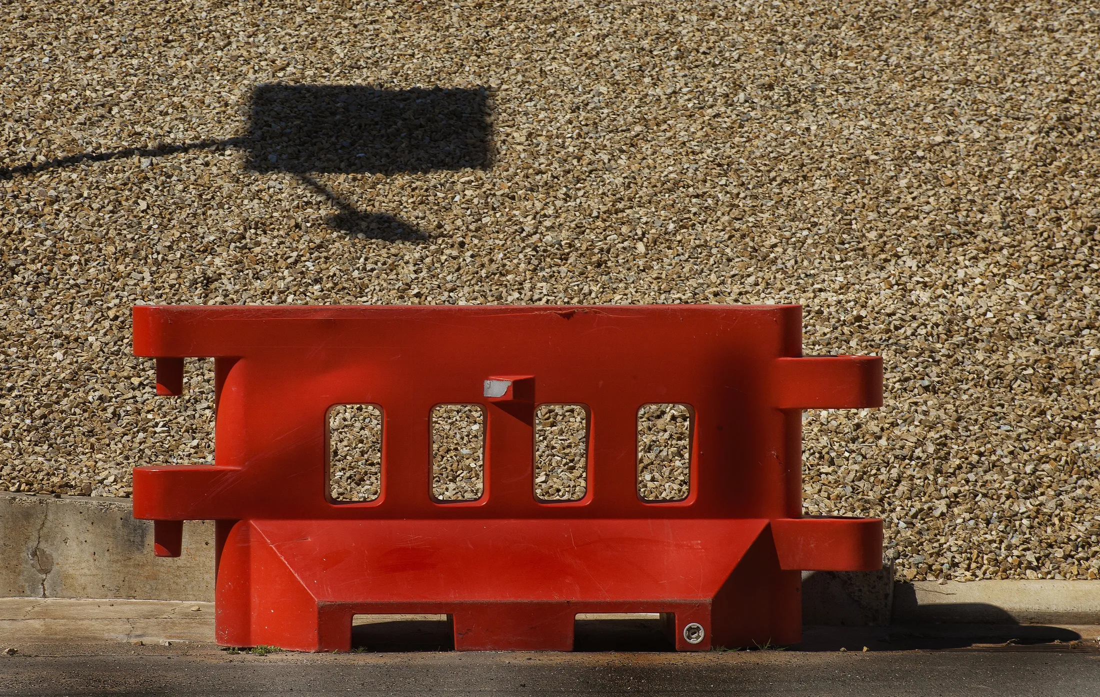 Orange barrier with shadow