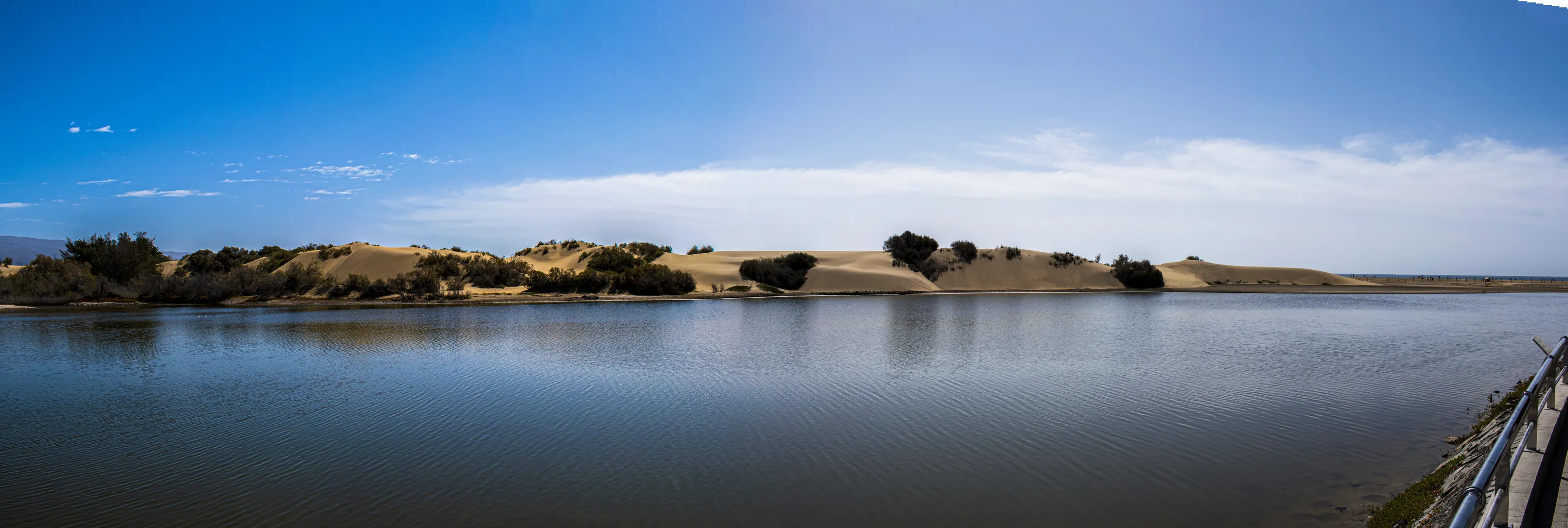 maspalomas lake with sandy dunes