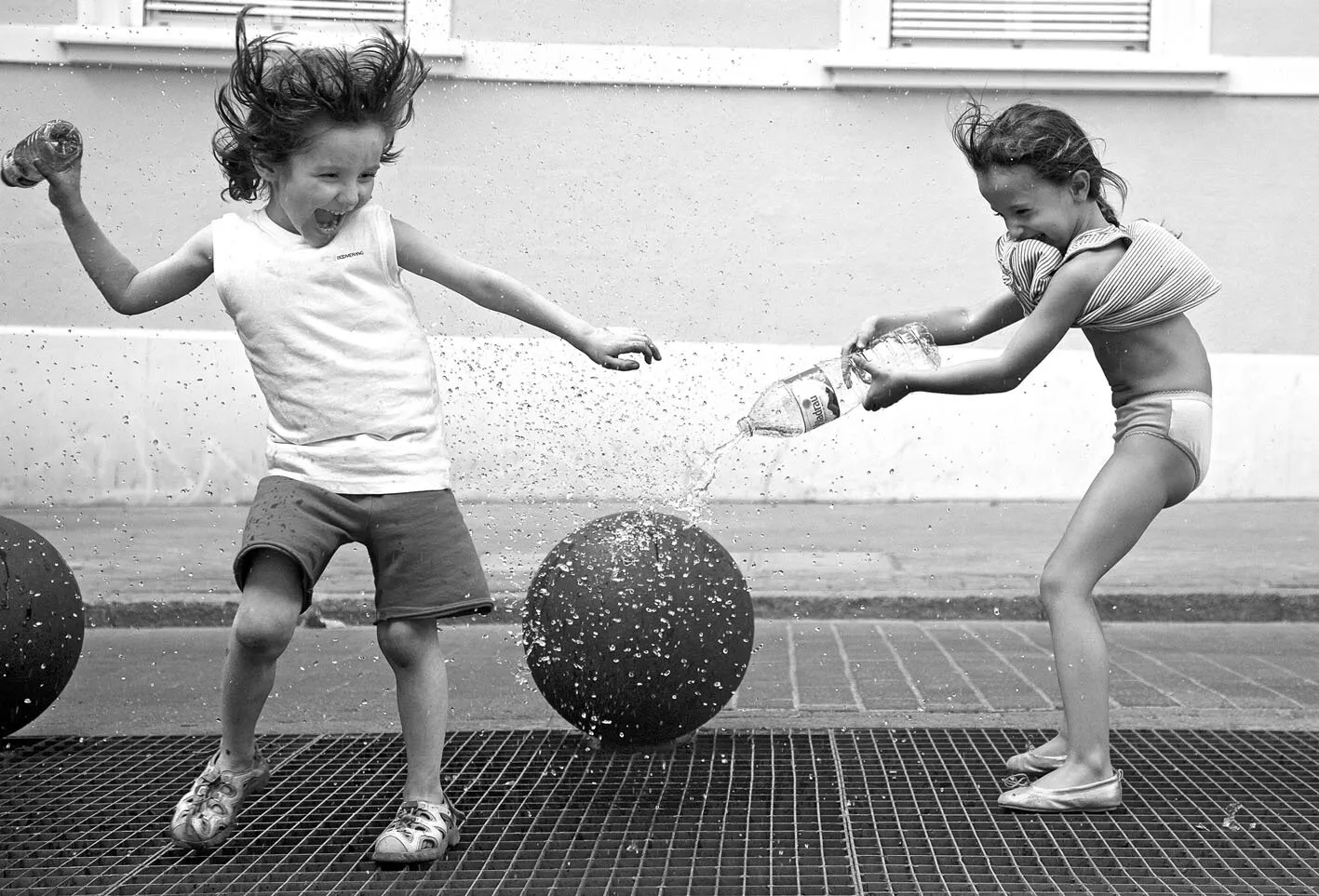 Children playing in the street, Barcelona.