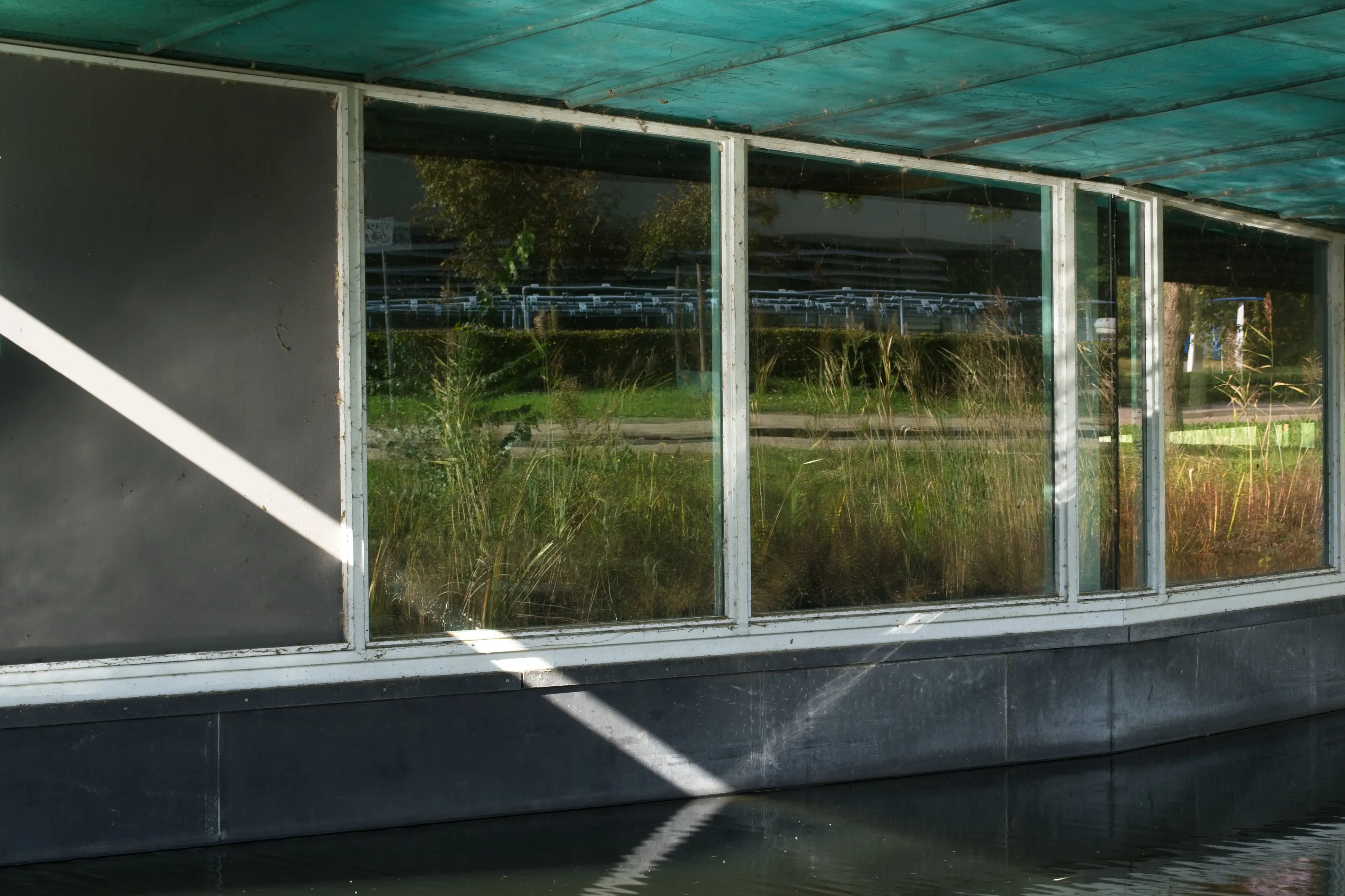 Windows, sun and water