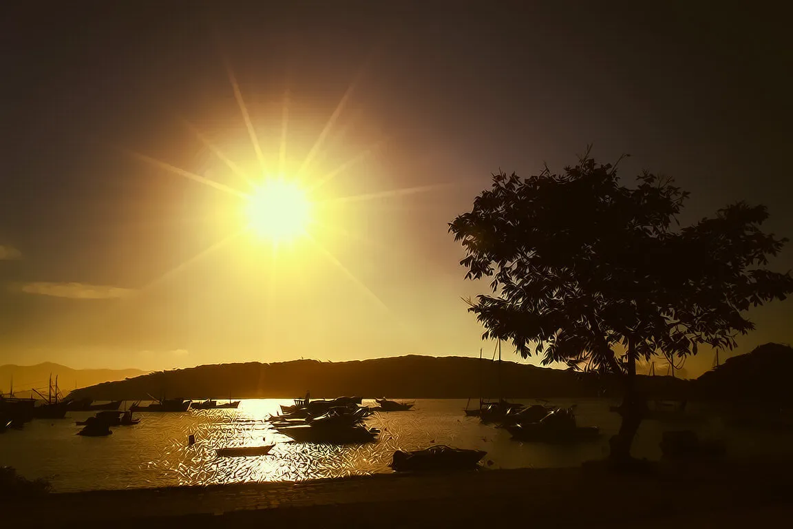 Sunset by a port