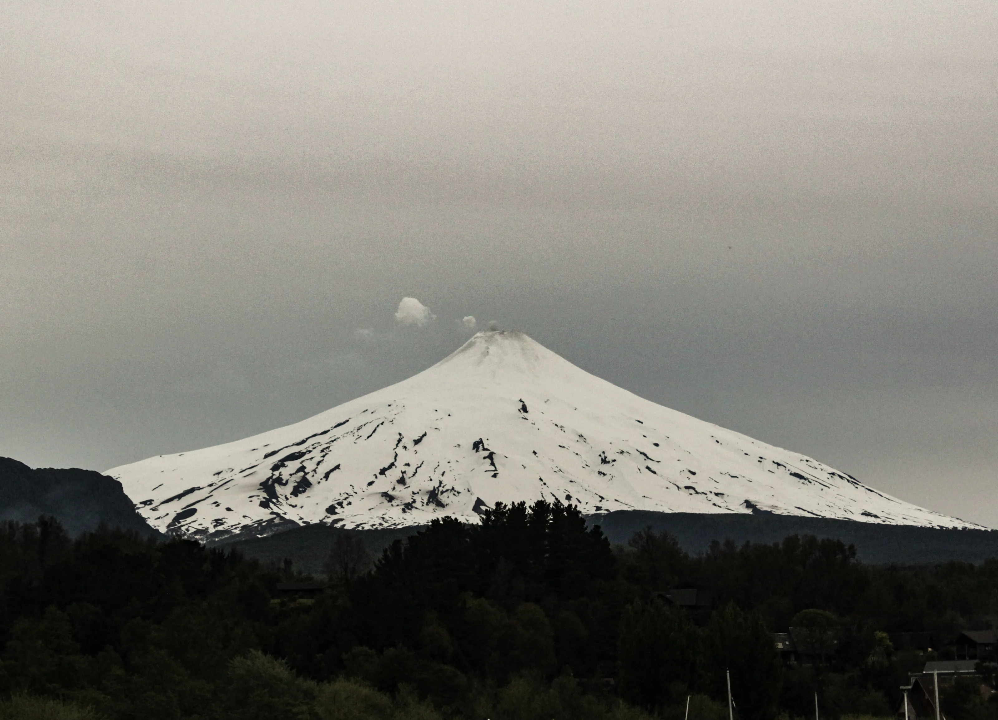 The smoke rising from an extinct volcano