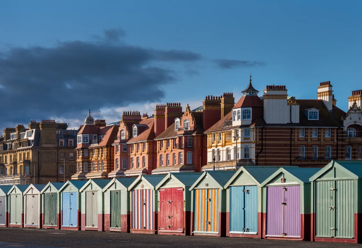 Beach huts on Hove promenade on a spring afternoon, South East England