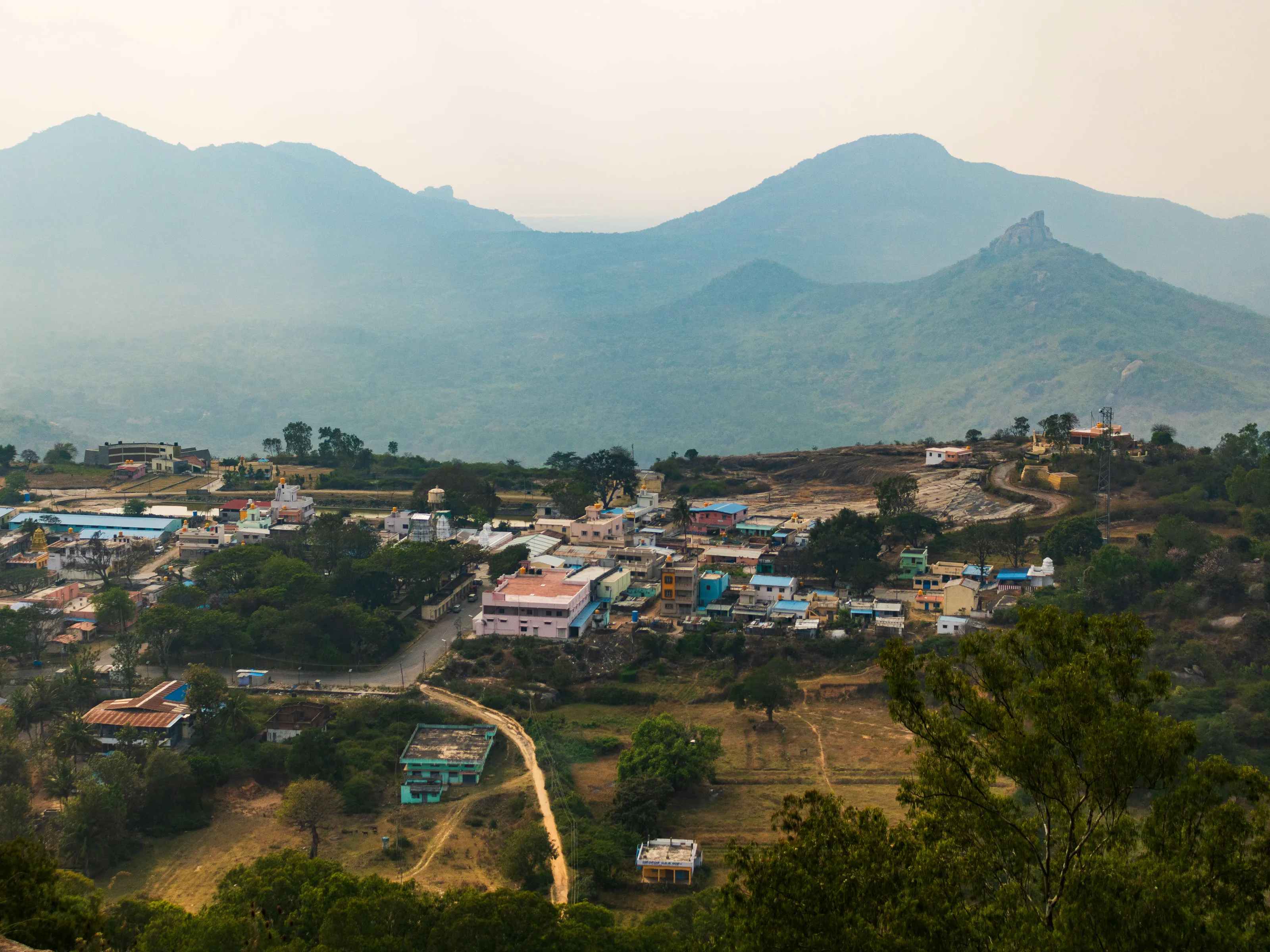 Into the Journey Home: The Village Beneath the Hills