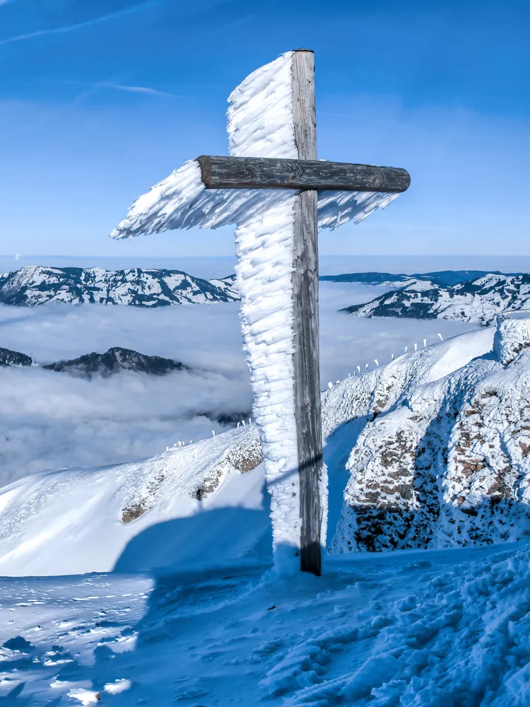 wind-blown rime ice found on a summit cross