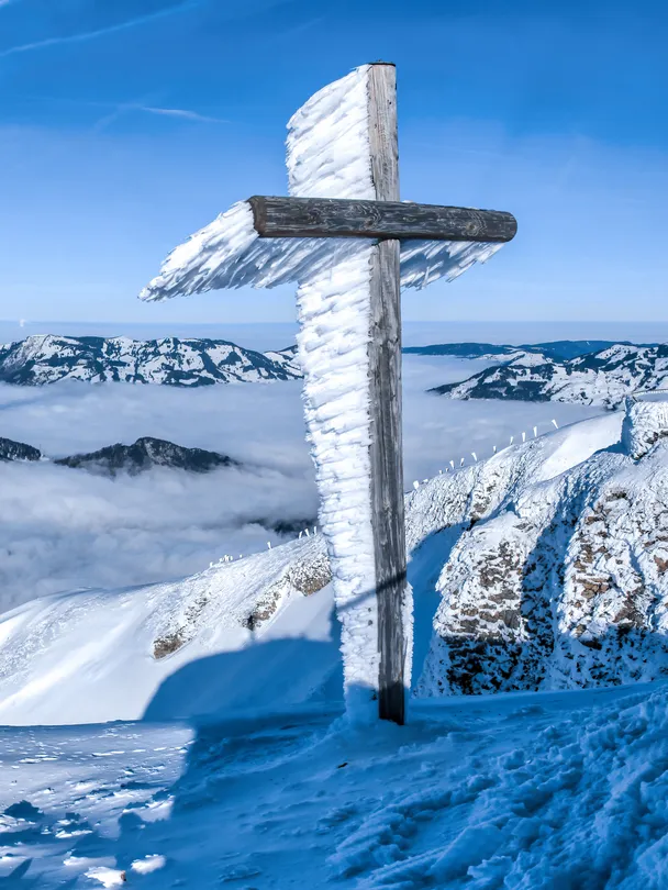 wind-blown rime ice found on a summit cross