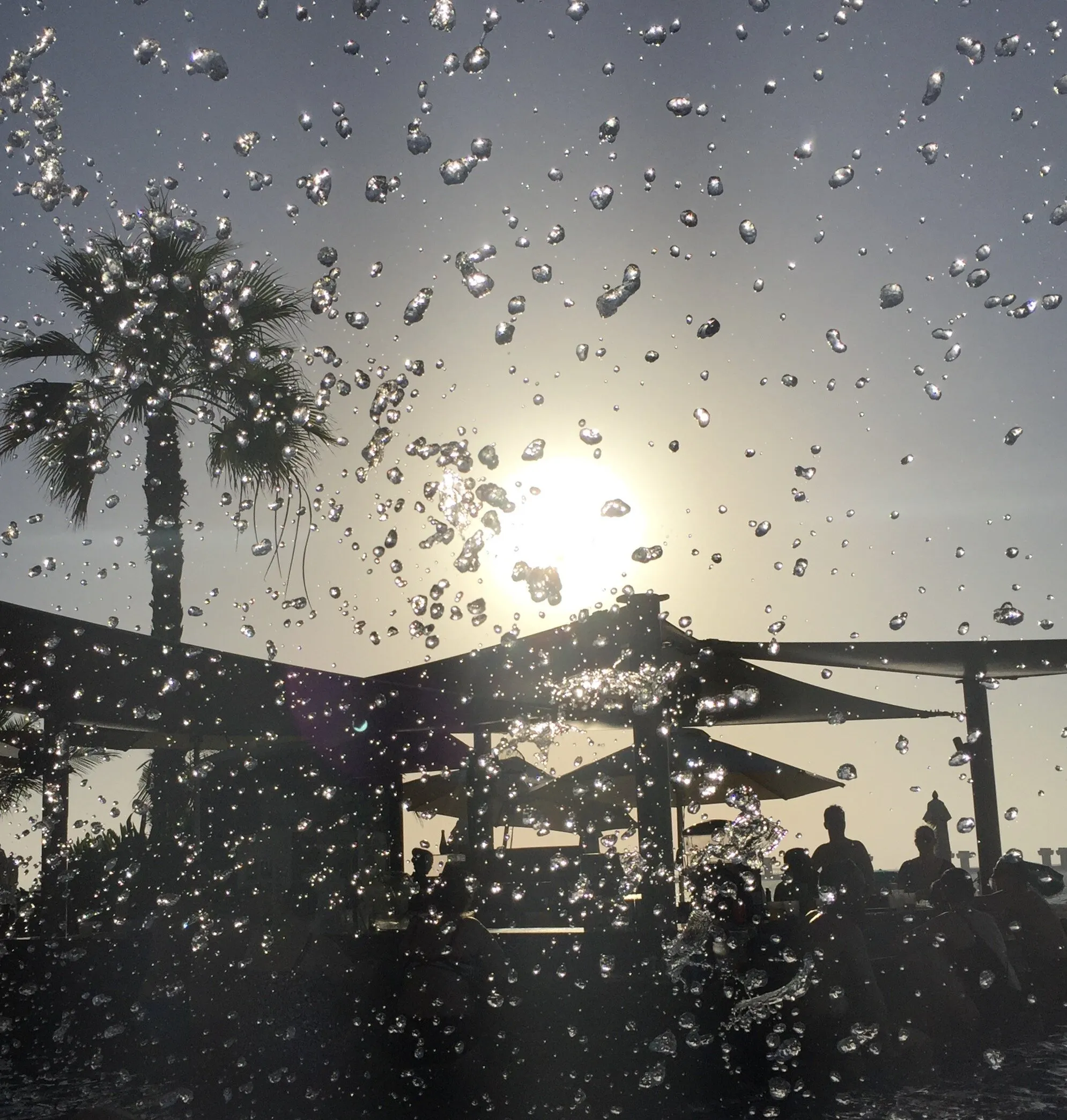 Splashing in the Swimming Pool During the Sunset