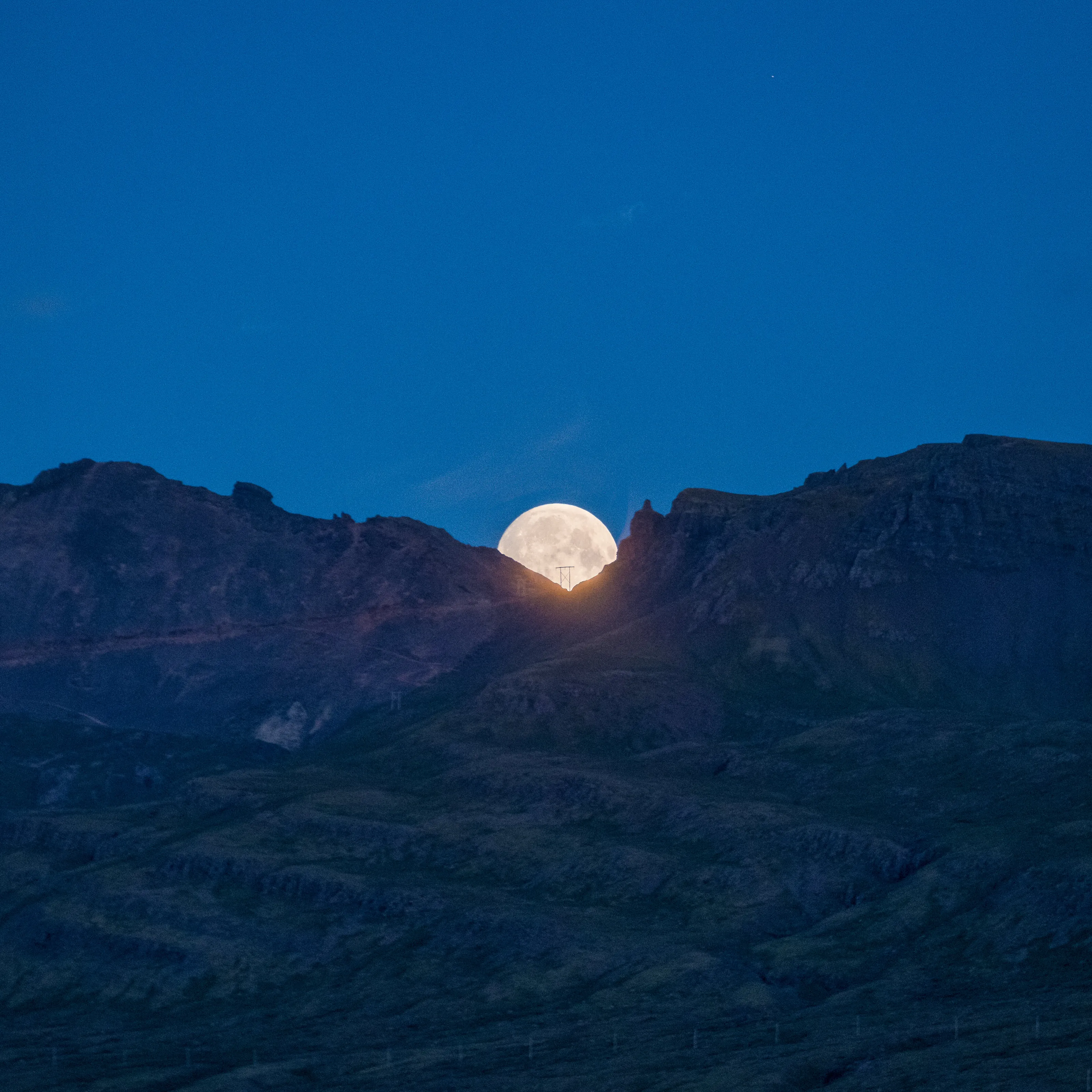 Moon over fjord