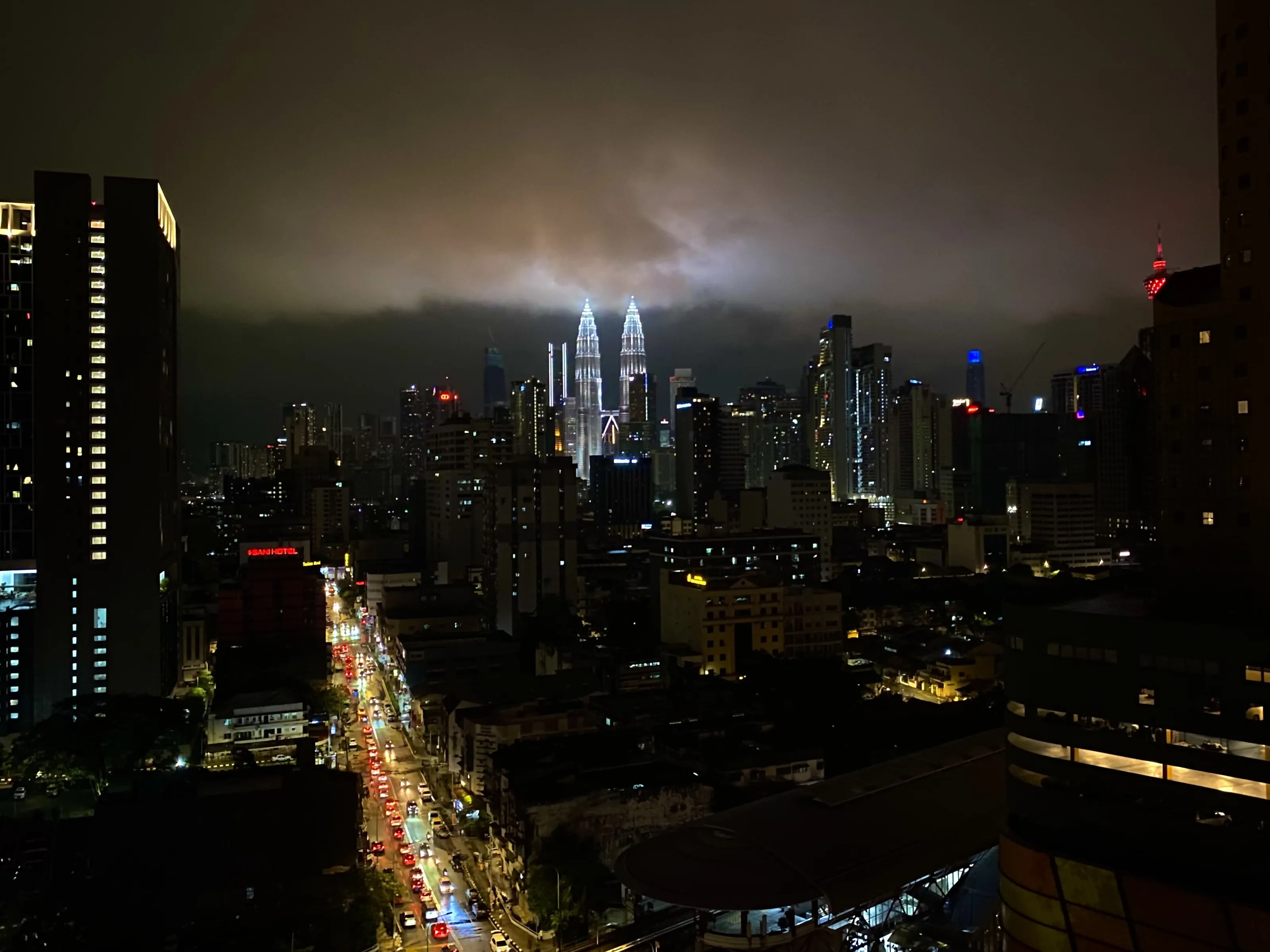 Petronas Twin Towe lighting the dark sky