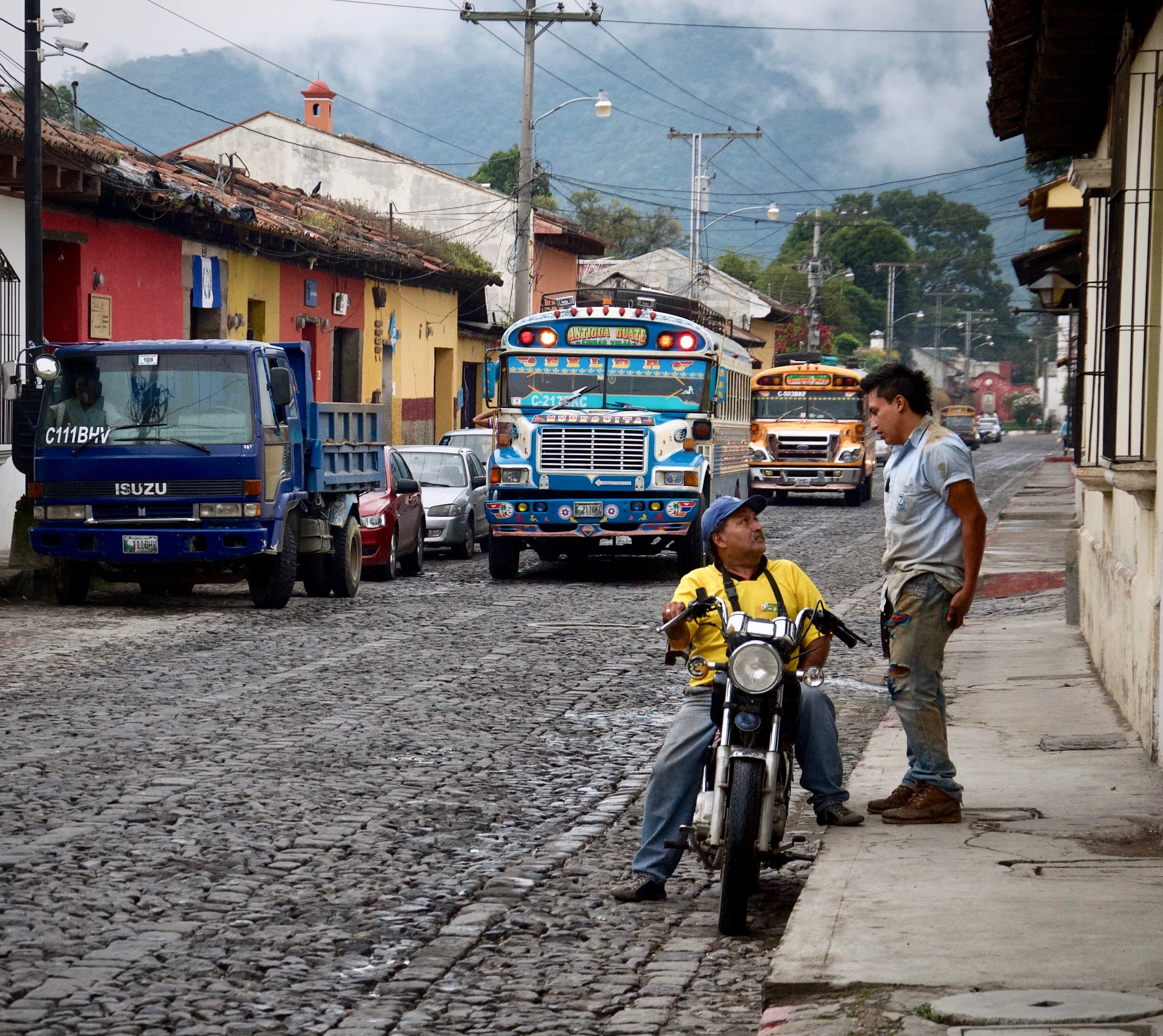Chatting by the road to Guatemala City. Antigua.